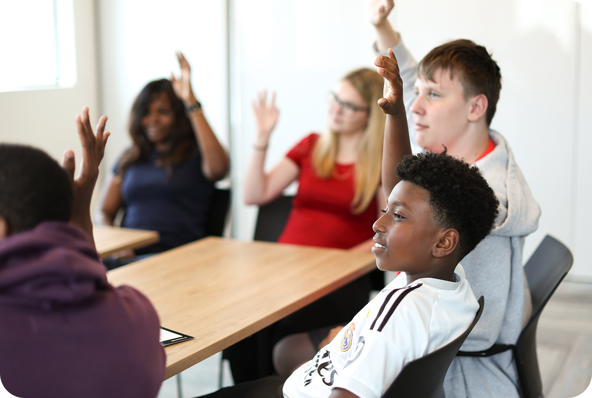 Video preview: students raising hands in class